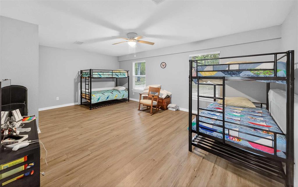 128 Armada Loop Payne Springs, TX 75156 - Photo 9 of 33 a bedroom with furniture and a window