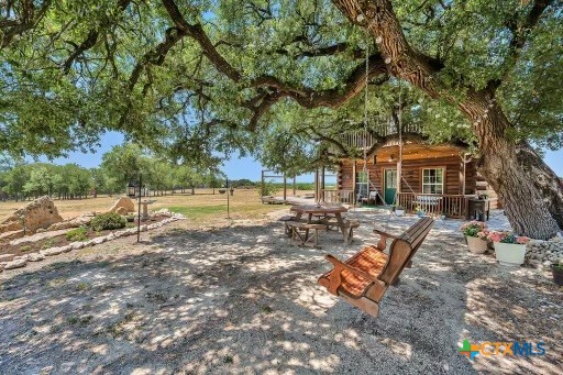 820 County Road 339 Moody, TX 76557 - Photo 5 of 36 a backyard of a house with barbeque oven