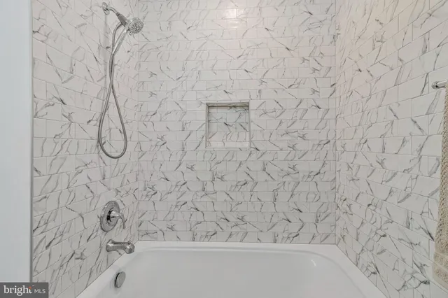 a bathroom with a bathtub
