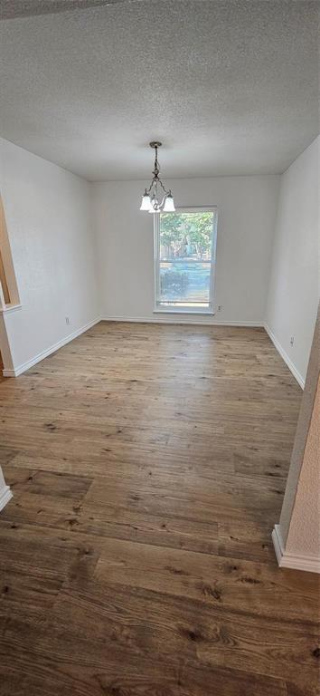 1900 Apple Valley Road Plano, TX 75023 - Photo 13 of 32 a view of a room with an empty space