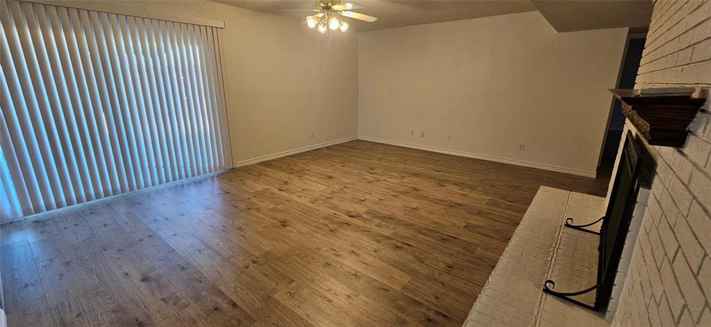 1900 Apple Valley Road Plano, TX 75023 - Photo 15 of 32 wooden floor in a hall with wooden floor