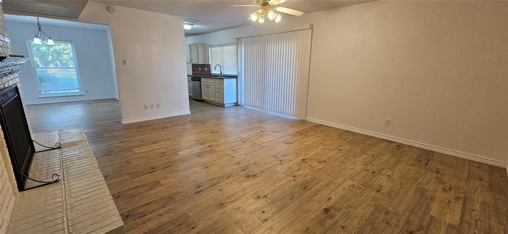 1900 Apple Valley Road Plano, TX 75023 - Photo 16 of 32 a view of empty room with wooden floor and fan