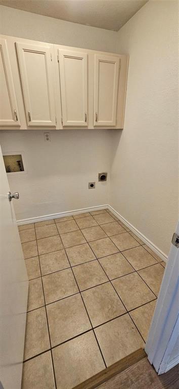 1900 Apple Valley Road Plano, TX 75023 - Photo 30 of 32 a view of a kitchen with white cabinets