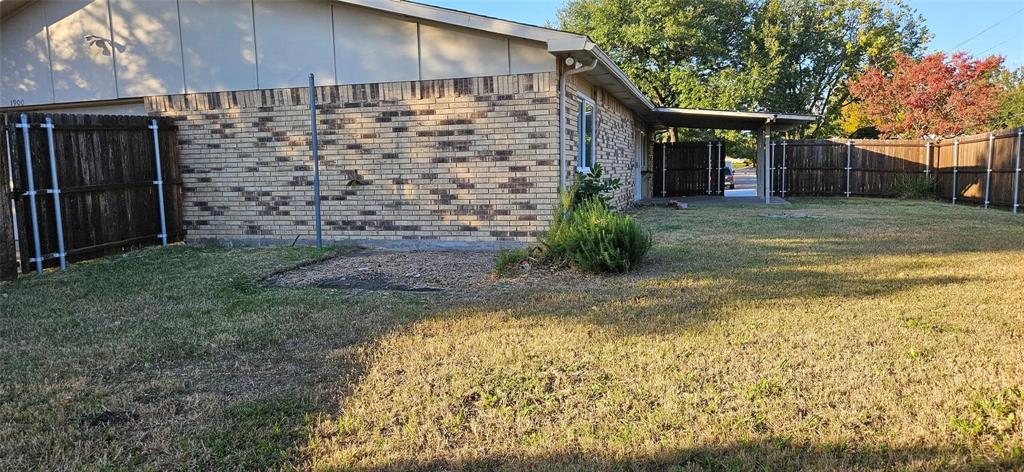 1900 Apple Valley Road Plano, TX 75023 - Photo 7 of 32 a view of a house with a yard