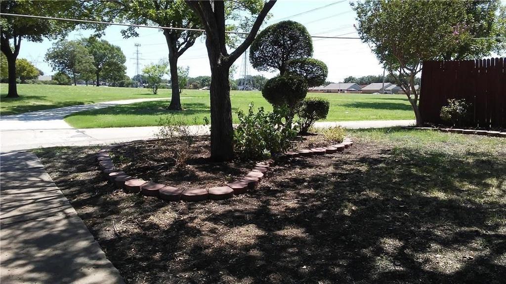 1900 Apple Valley Road Plano, TX 75023 - Photo 9 of 32 a view of a garden