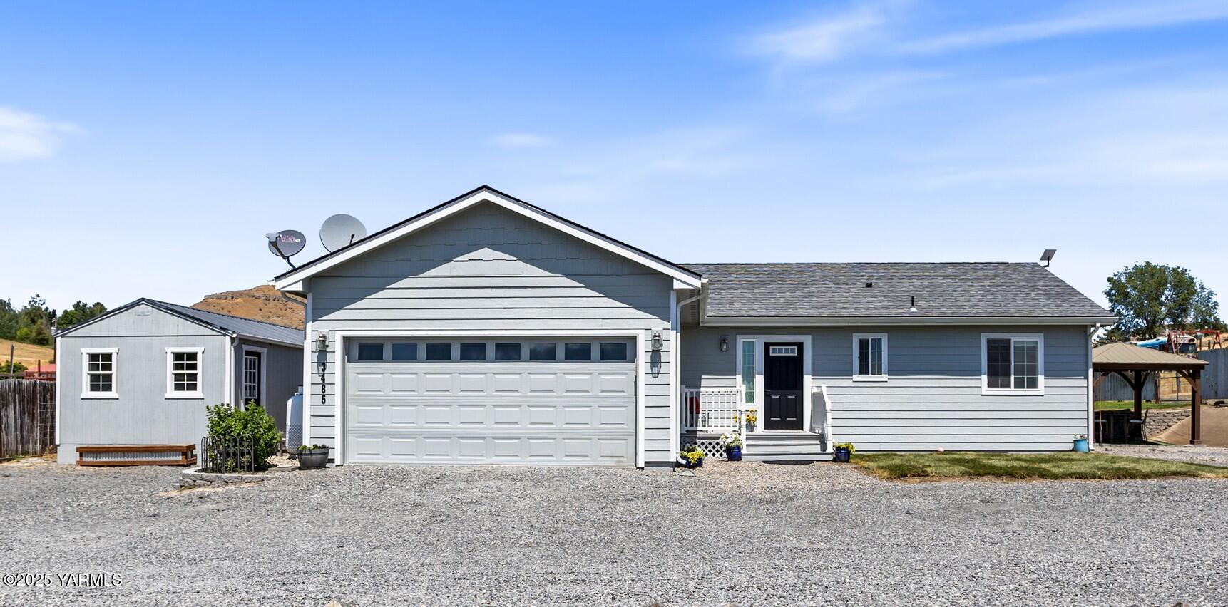3485 Selah Loop Road Selah, WA 98942 - Photo 1 of 38 a house with a outdoor space