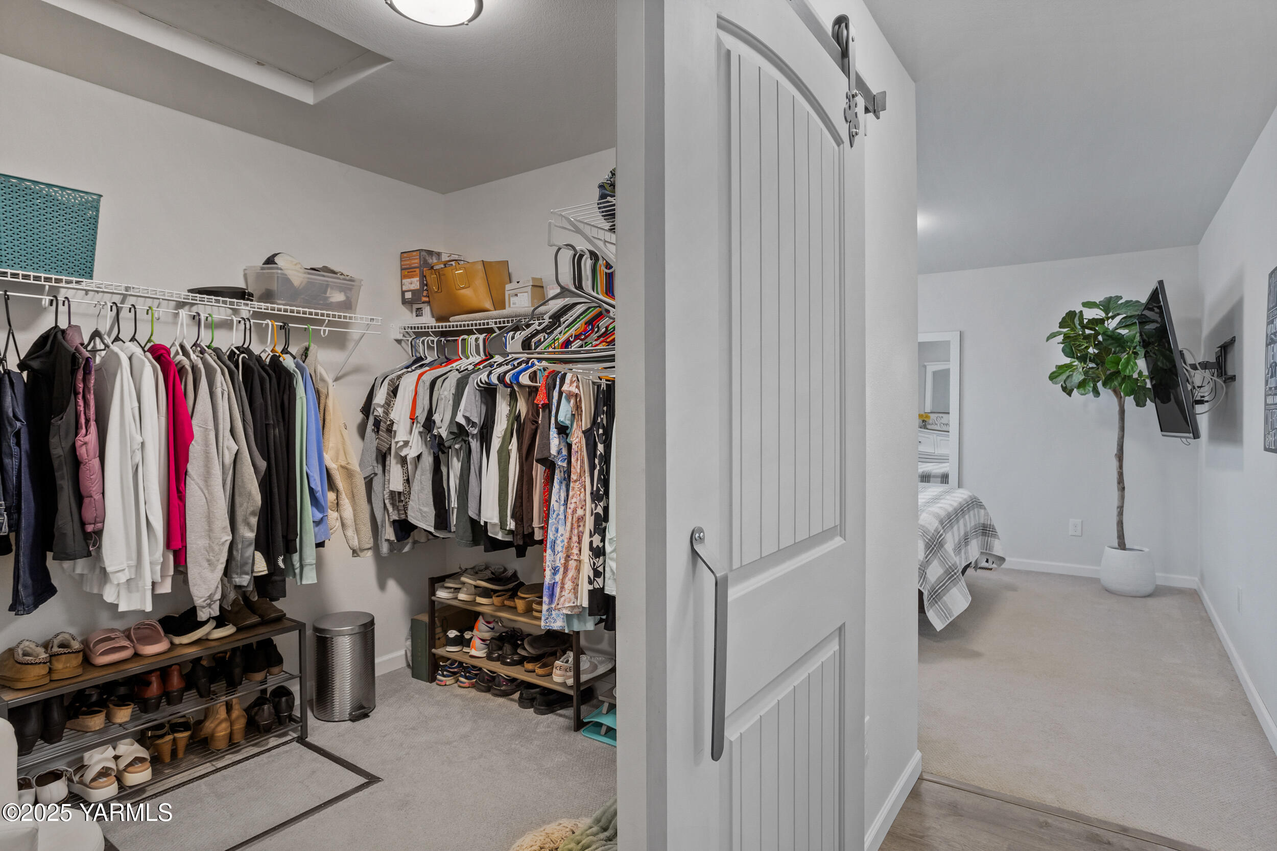 3485 Selah Loop Road Selah, WA 98942 - Photo 13 of 38 a view of walk in closet with clothes