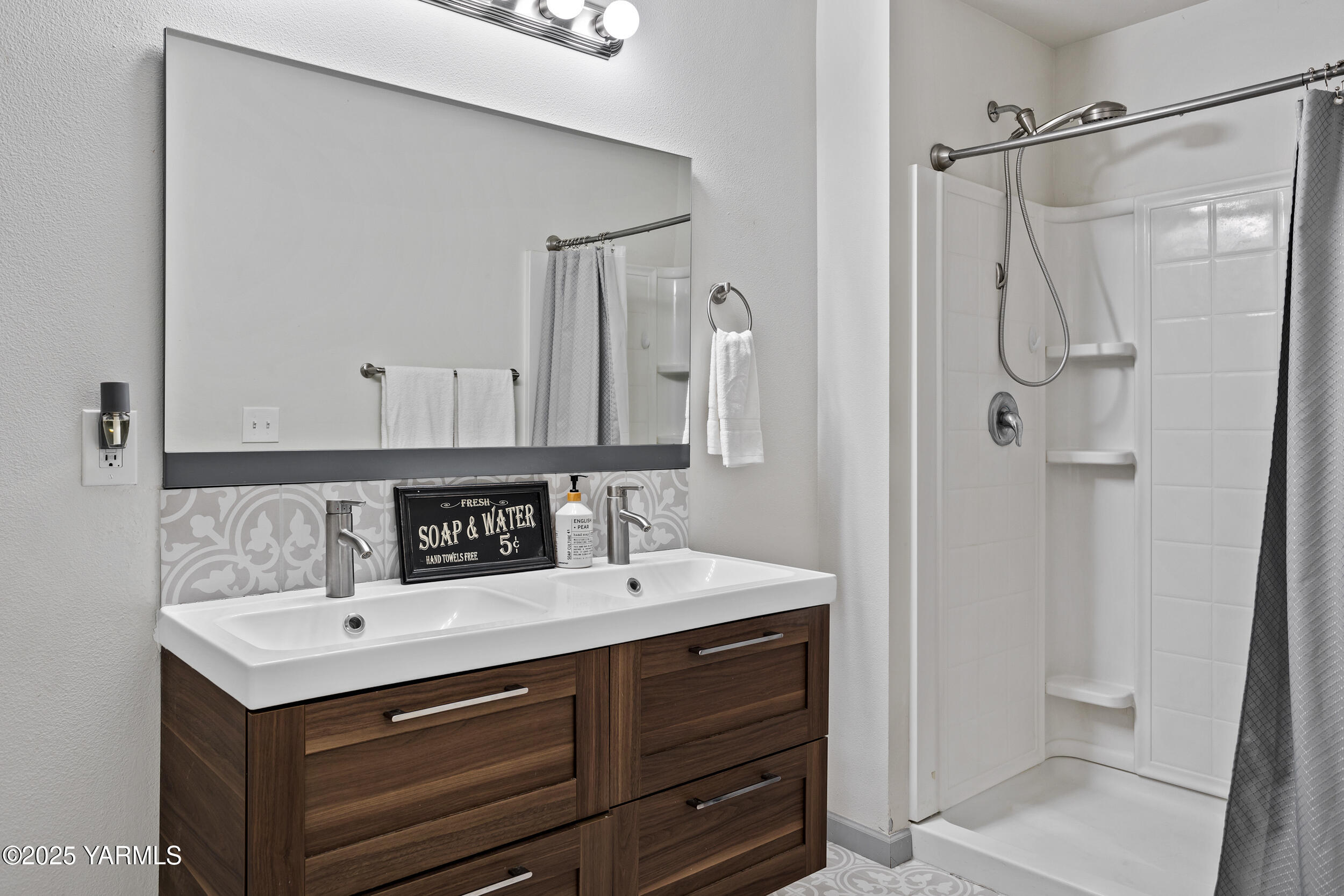 3485 Selah Loop Road Selah, WA 98942 - Photo 14 of 38 a bathroom with a sink vanity granite shower and a mirror
