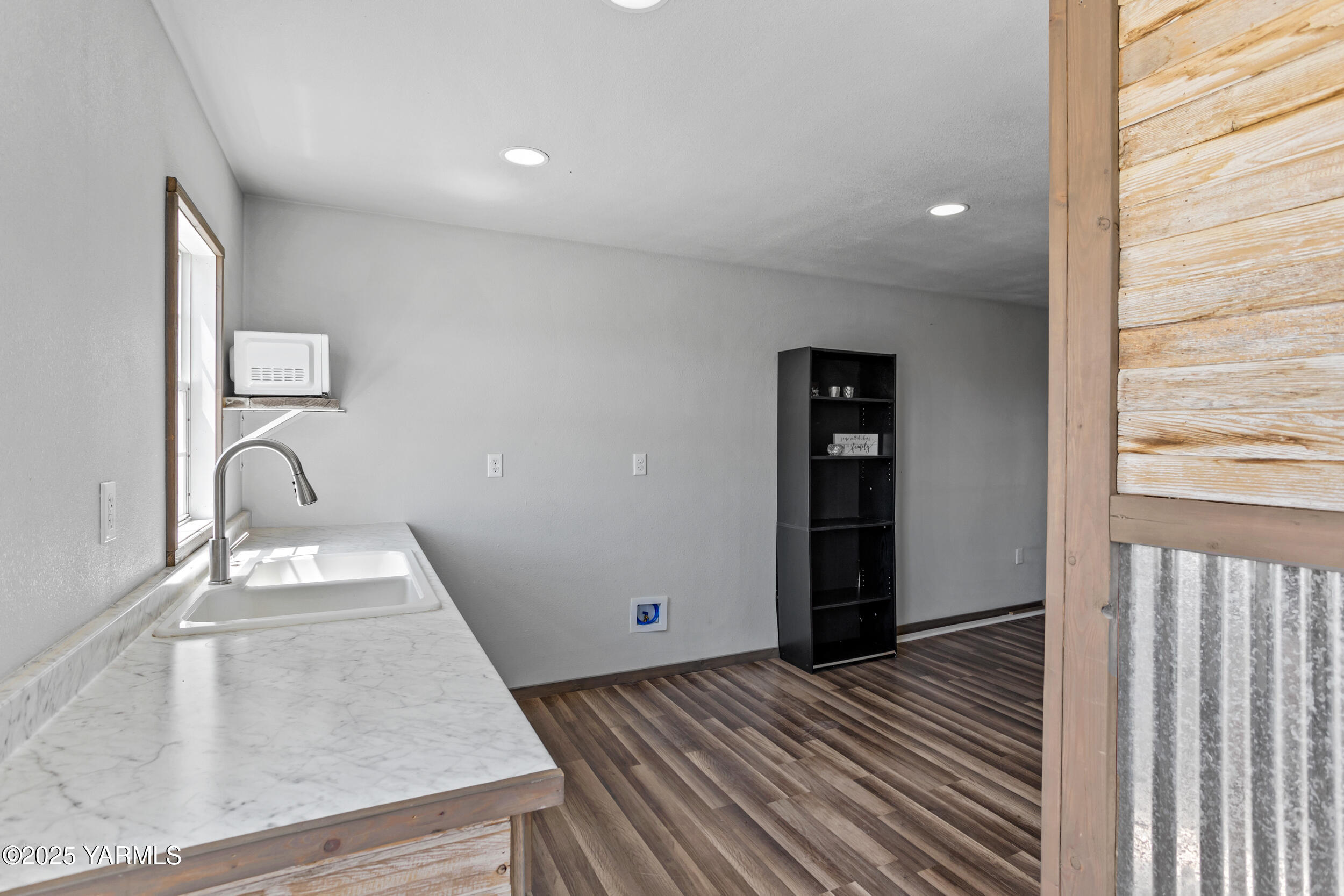 3485 Selah Loop Road Selah, WA 98942 - Photo 24 of 38 a view of empty room with wooden floor