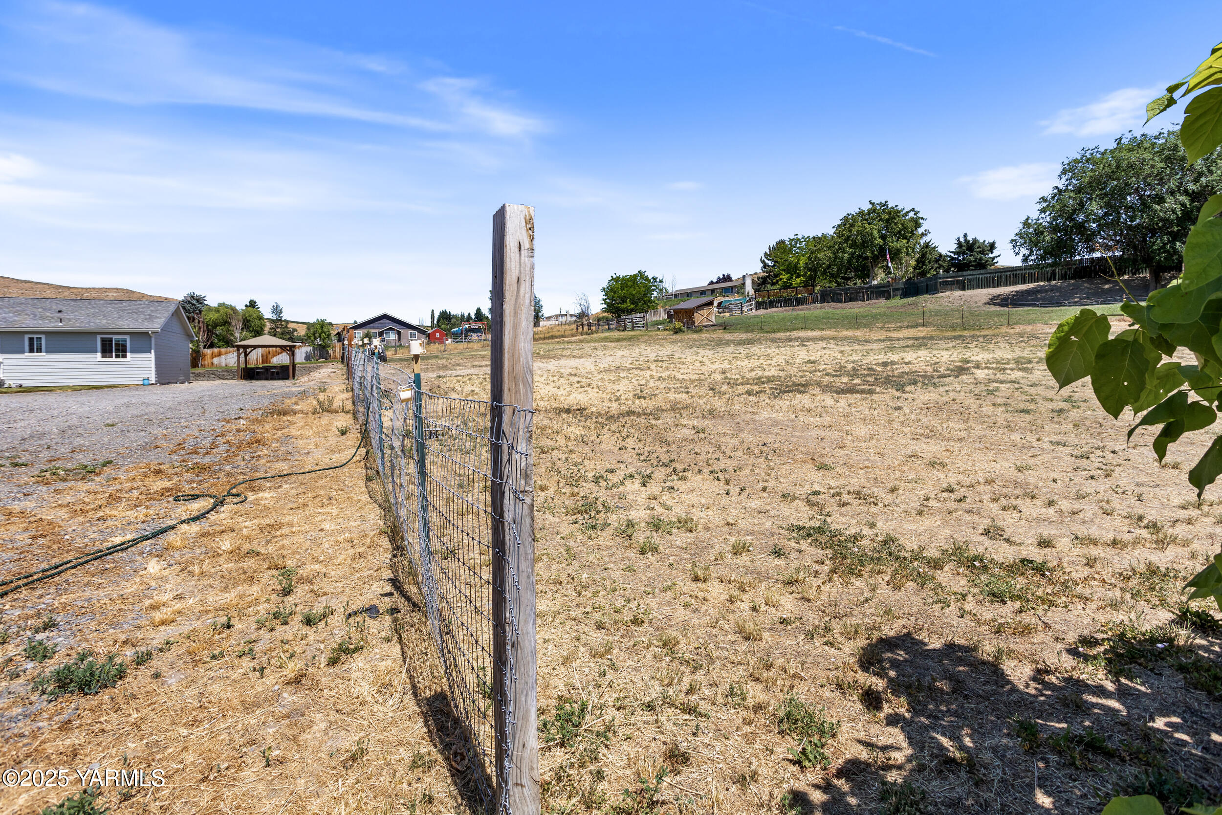 3485 Selah Loop Road Selah, WA 98942 - Photo 34 of 38 a view of a beach with a yard