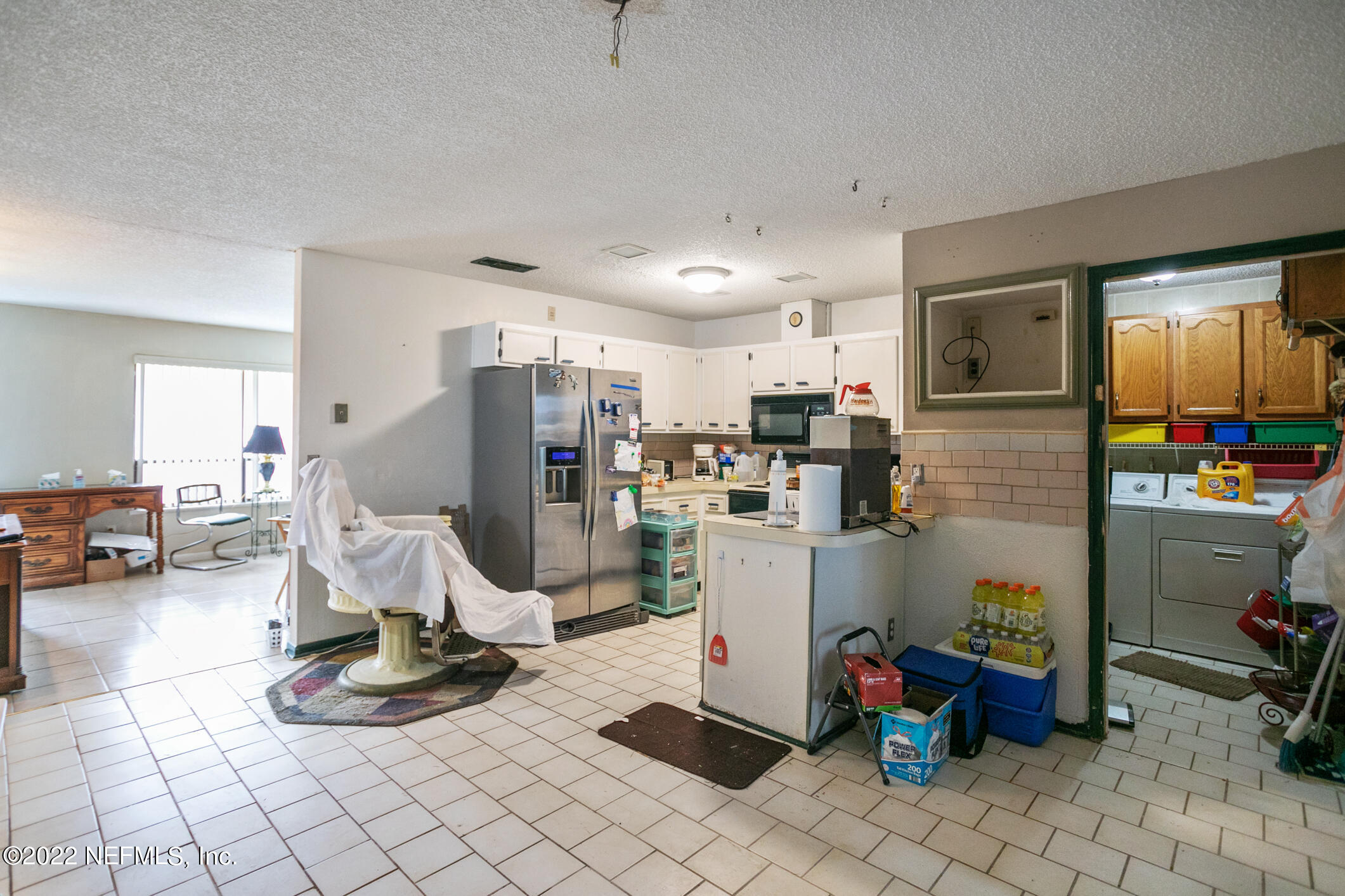 3150 Ricky Drive Jacksonville, FL 32223 - Photo 14 of 28 a view of a room with gym equipment