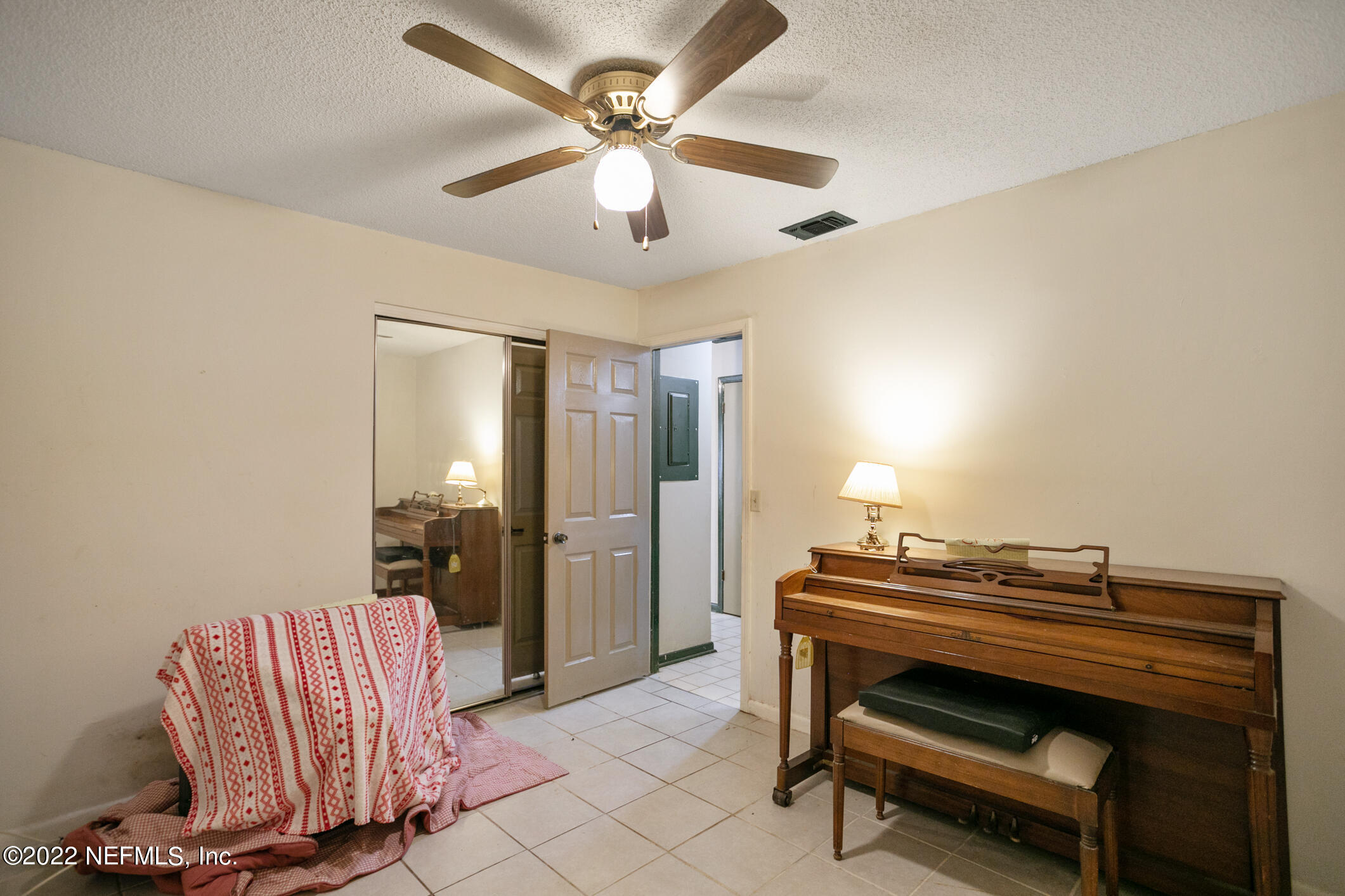 3150 Ricky Drive Jacksonville, FL 32223 - Photo 21 of 28 a view of room with wooden floor