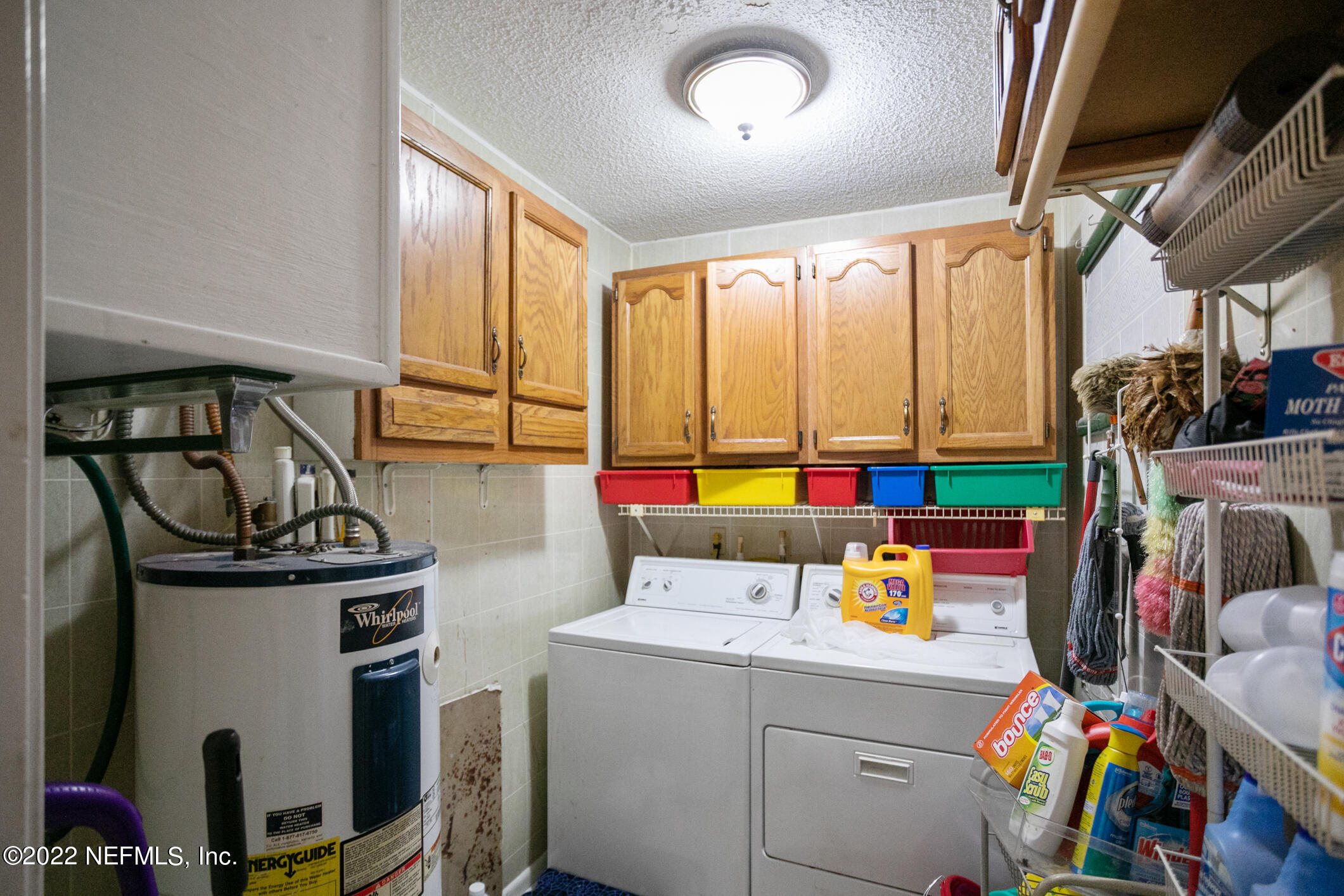 3150 Ricky Drive Jacksonville, FL 32223 - Photo 22 of 28 a utility room with dryer and washer