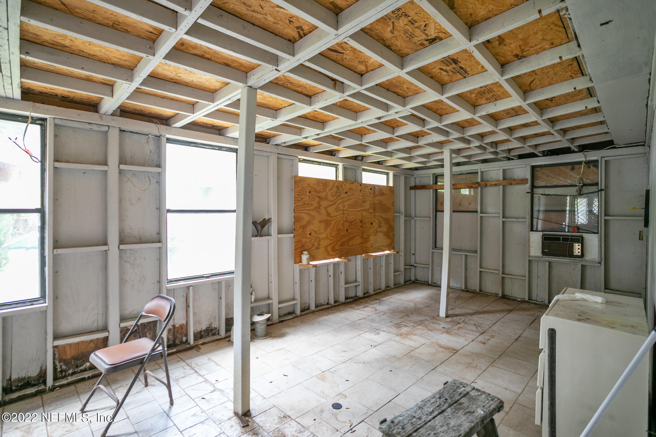 3150 Ricky Drive Jacksonville, FL 32223 - Photo 23 of 28 a view of a room with wooden floor and furniture