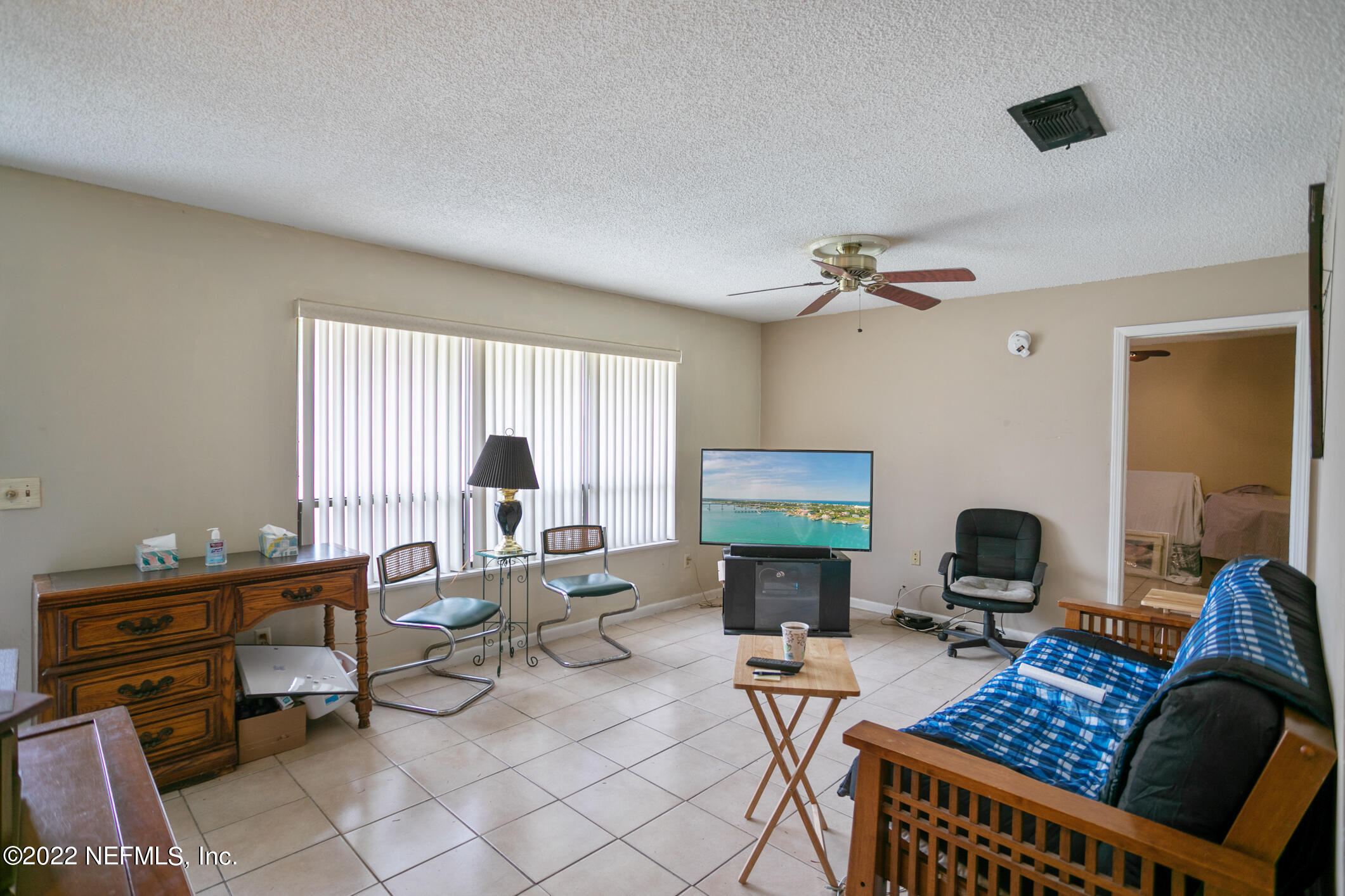 3150 Ricky Drive Jacksonville, FL 32223 - Photo 5 of 28 a workspace with furniture and window