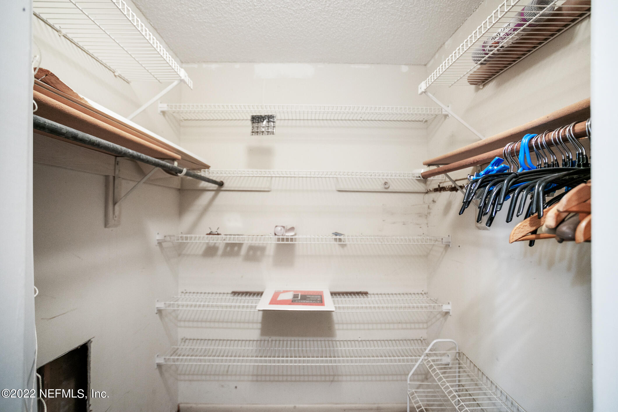 3150 Ricky Drive Jacksonville, FL 32223 - Photo 9 of 28 a view of walk in closet with clothes and shoes