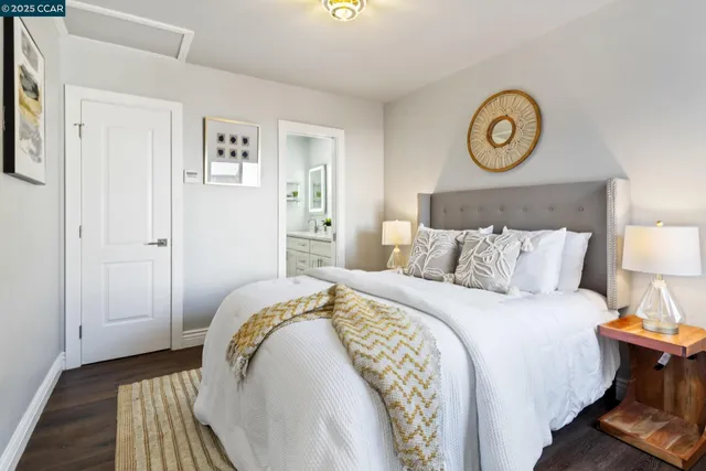 a bedroom with bed and a window