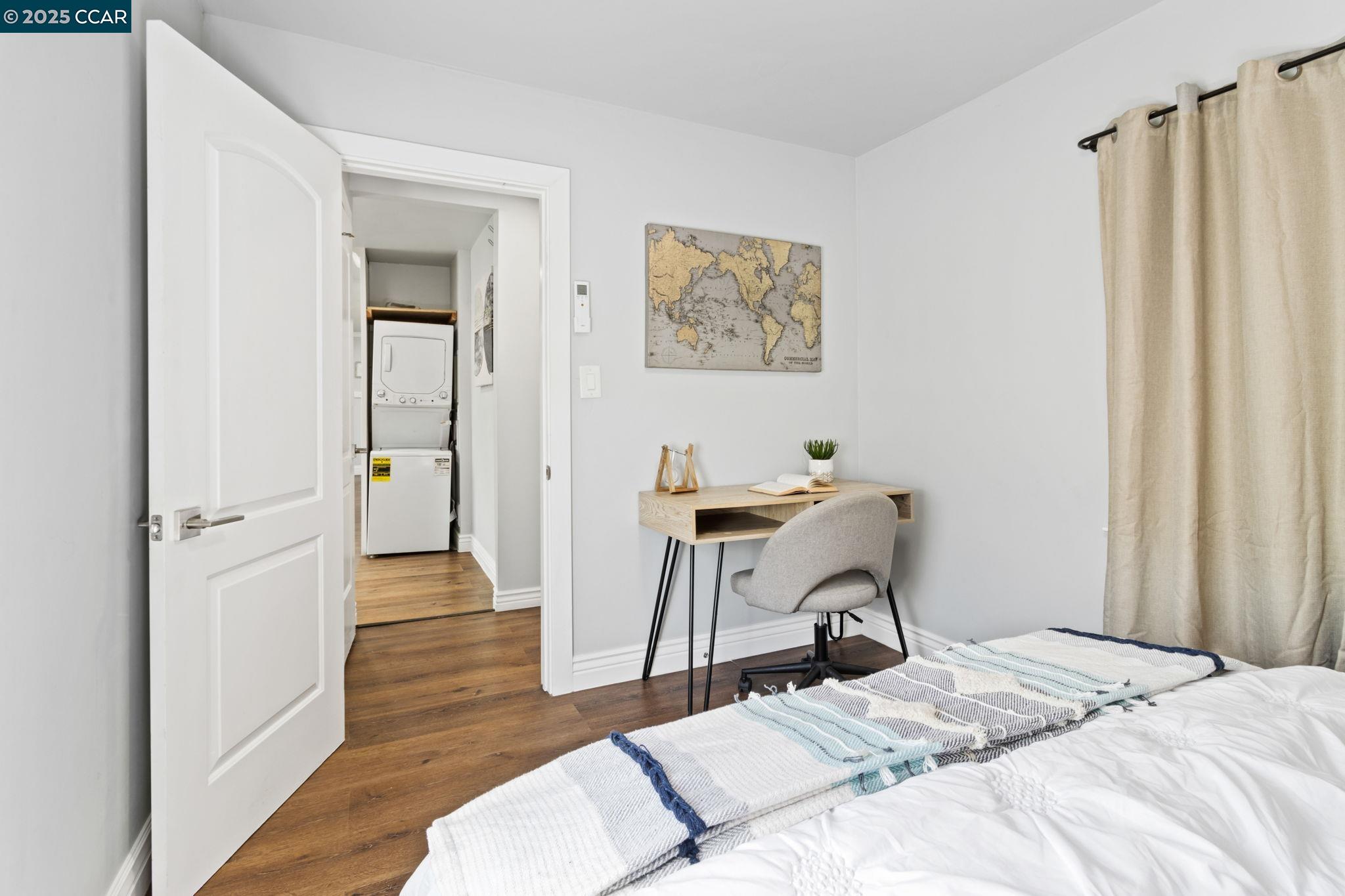 4010 Masterson Street Oakland, CA 94619 - Photo 16 of 27 a bedroom with a bed and a table in it