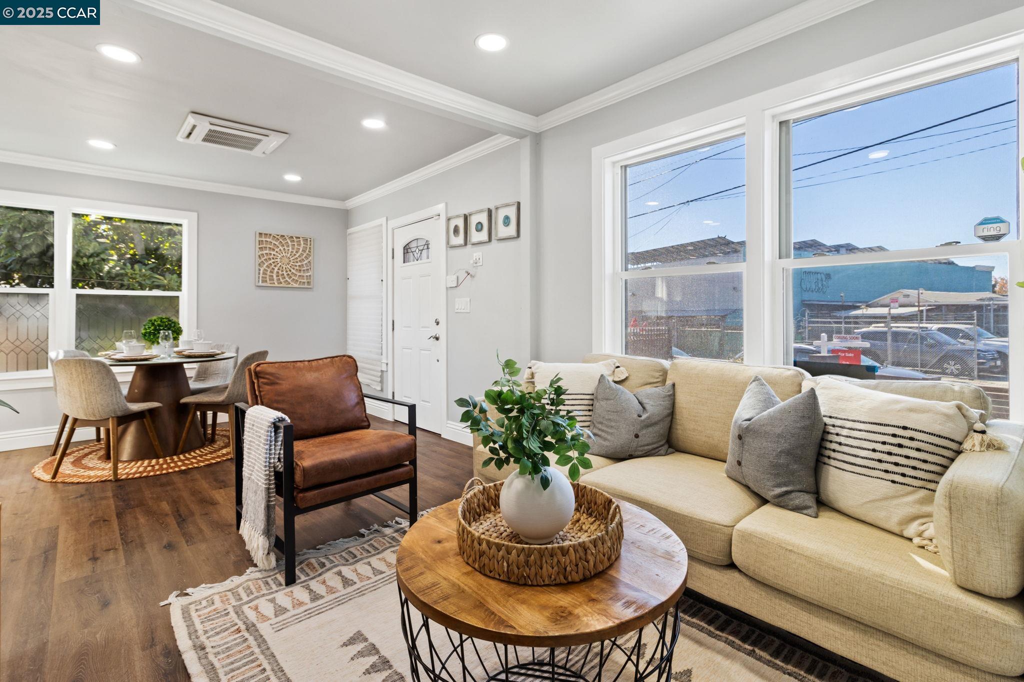 4010 Masterson Street Oakland, CA 94619 - Photo 3 of 27 a living room with furniture and a large window