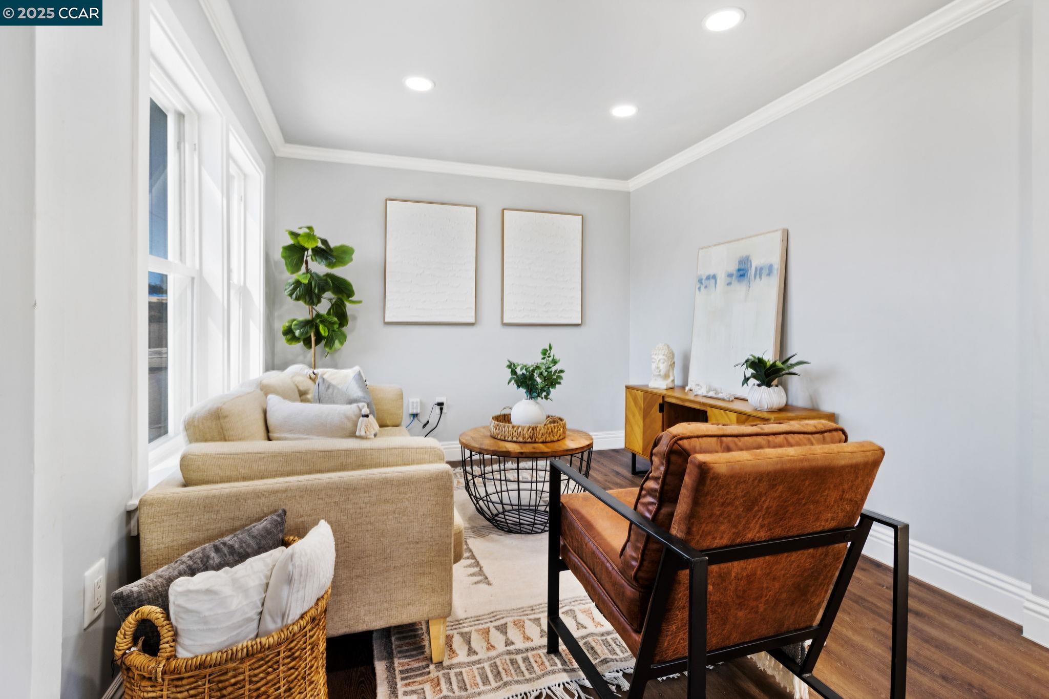 4010 Masterson Street Oakland, CA 94619 - Photo 4 of 27 a living room with furniture and a potted plant