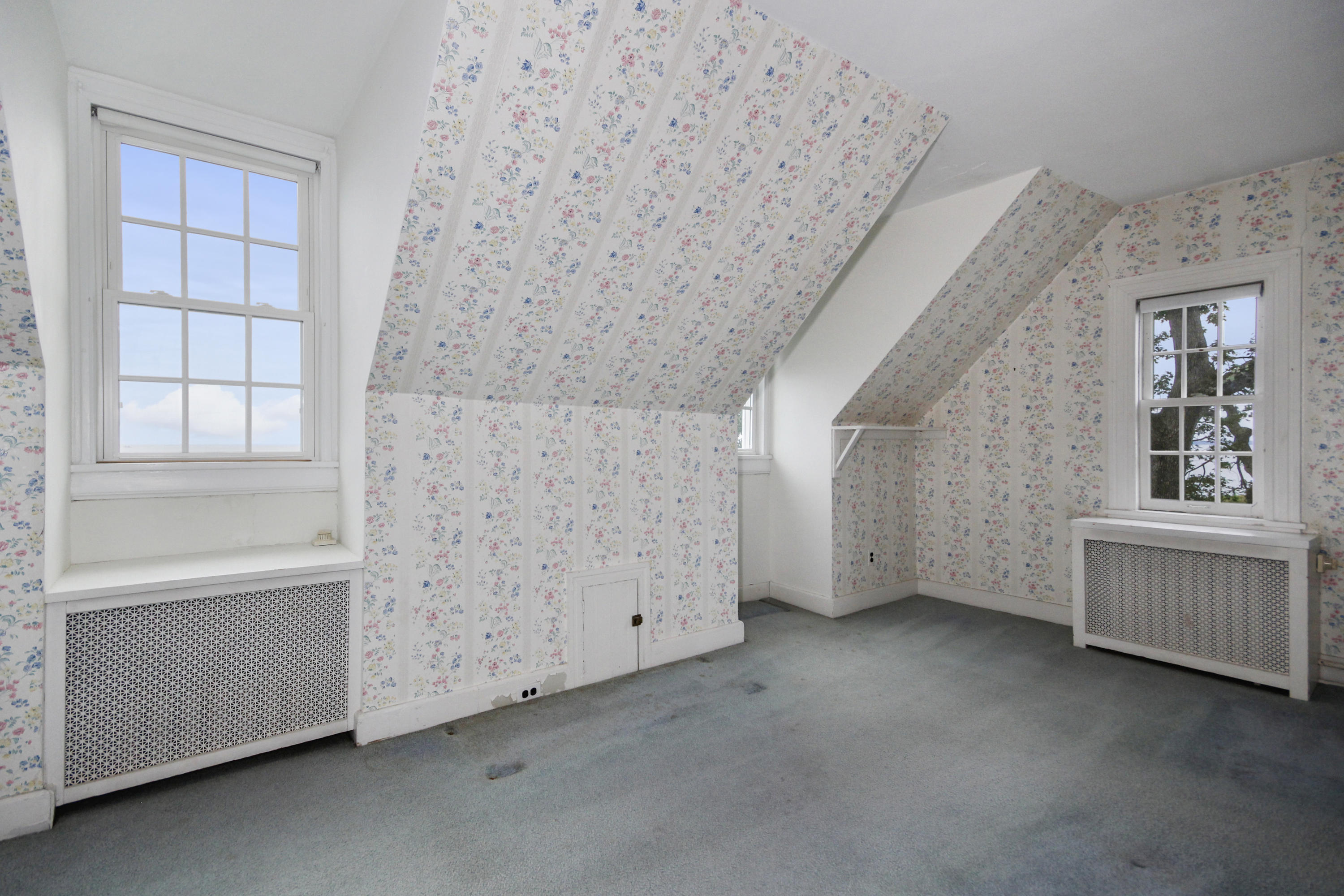 237 Long Neck Point Road Darien, CT 06820 - Photo 22 of 38 a view of an empty room with a window