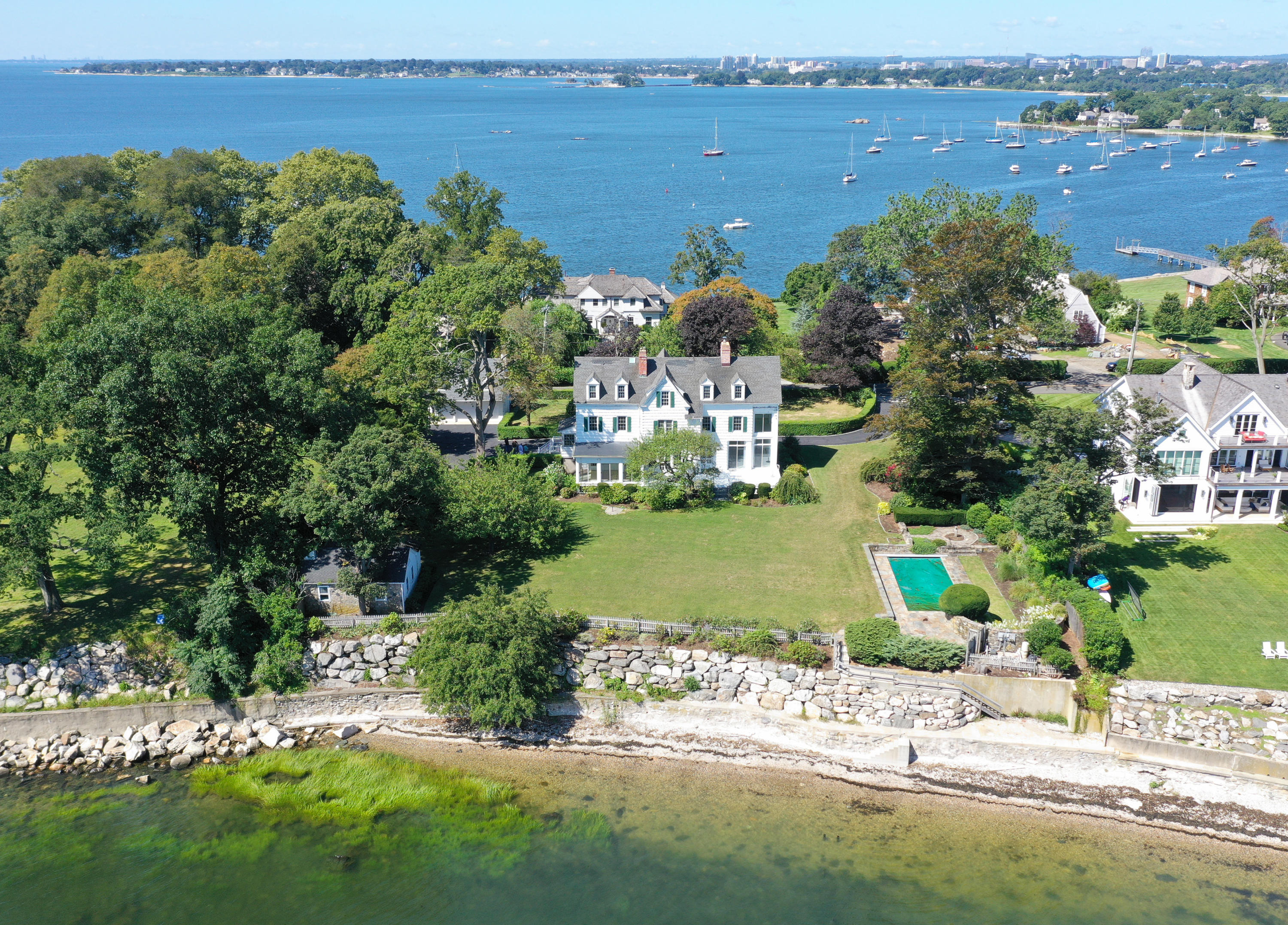 237 Long Neck Point Road Darien, CT 06820 - Photo 3 of 38 an aerial view of a houses with outdoor space and lake view