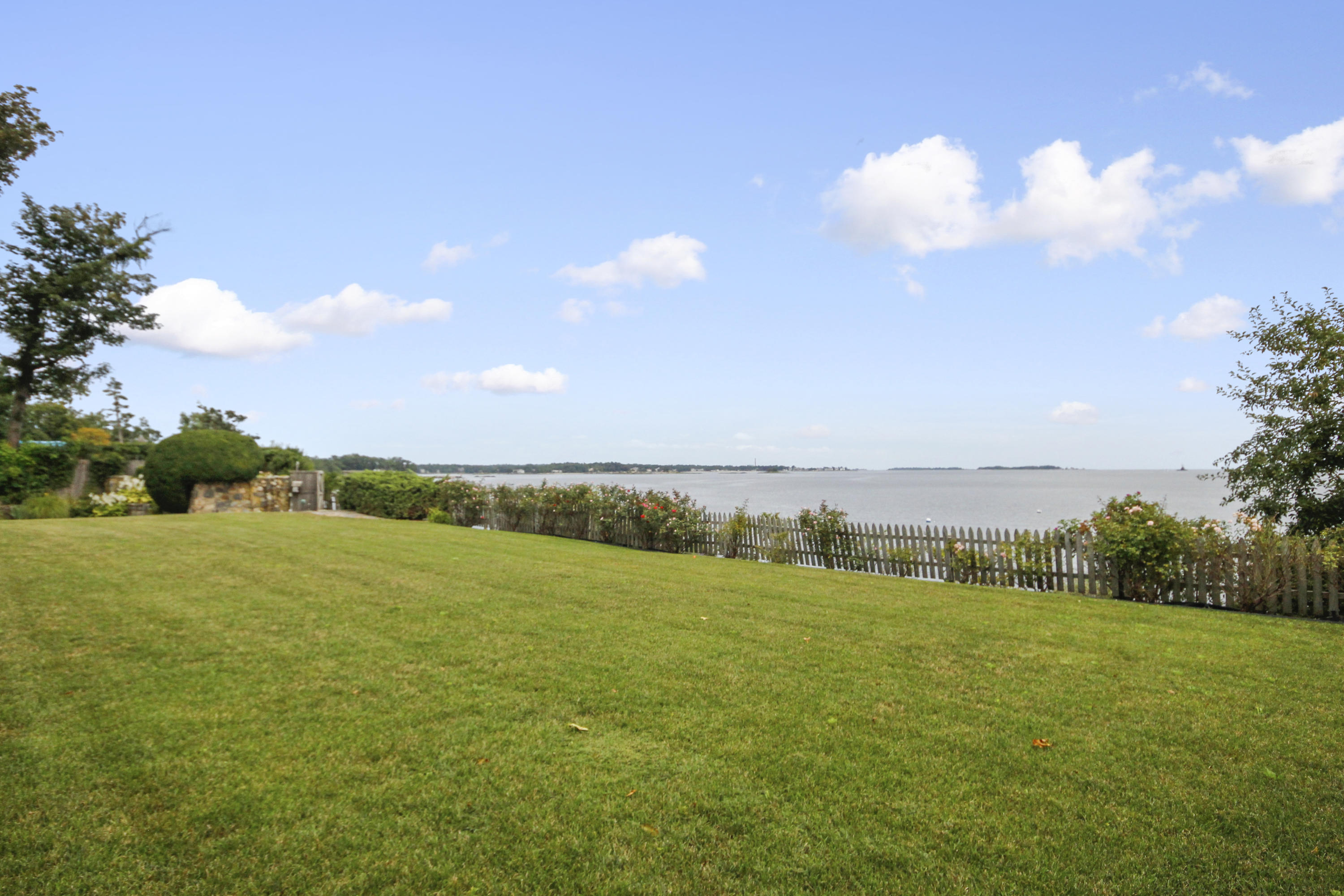 237 Long Neck Point Road Darien, CT 06820 - Photo 31 of 38 a view of an ocean and beach