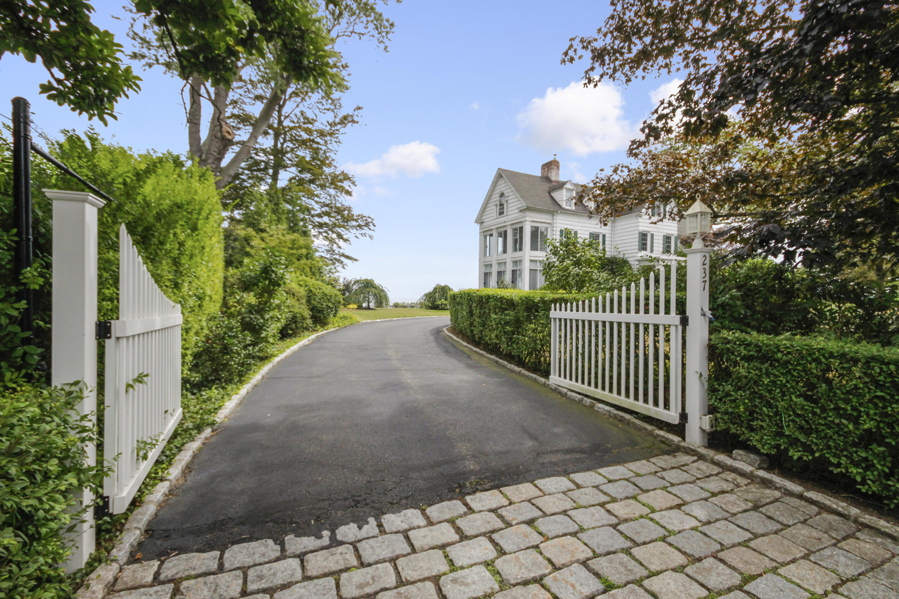 237 Long Neck Point Road Darien, CT 06820 - Photo 4 of 38 a view of a street from a balcony