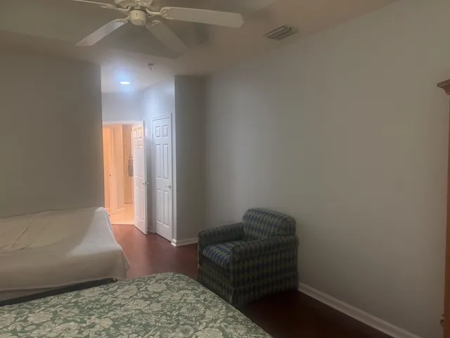 a bathroom with a sink toilet and a mirror