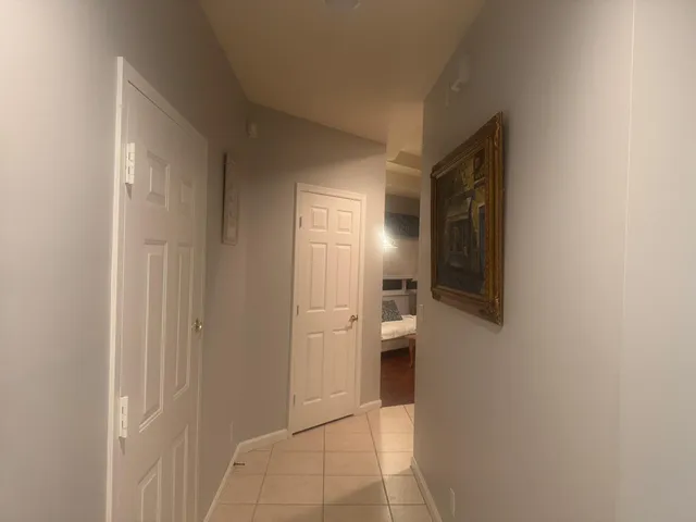 a kitchen with a sink appliances and cabinets