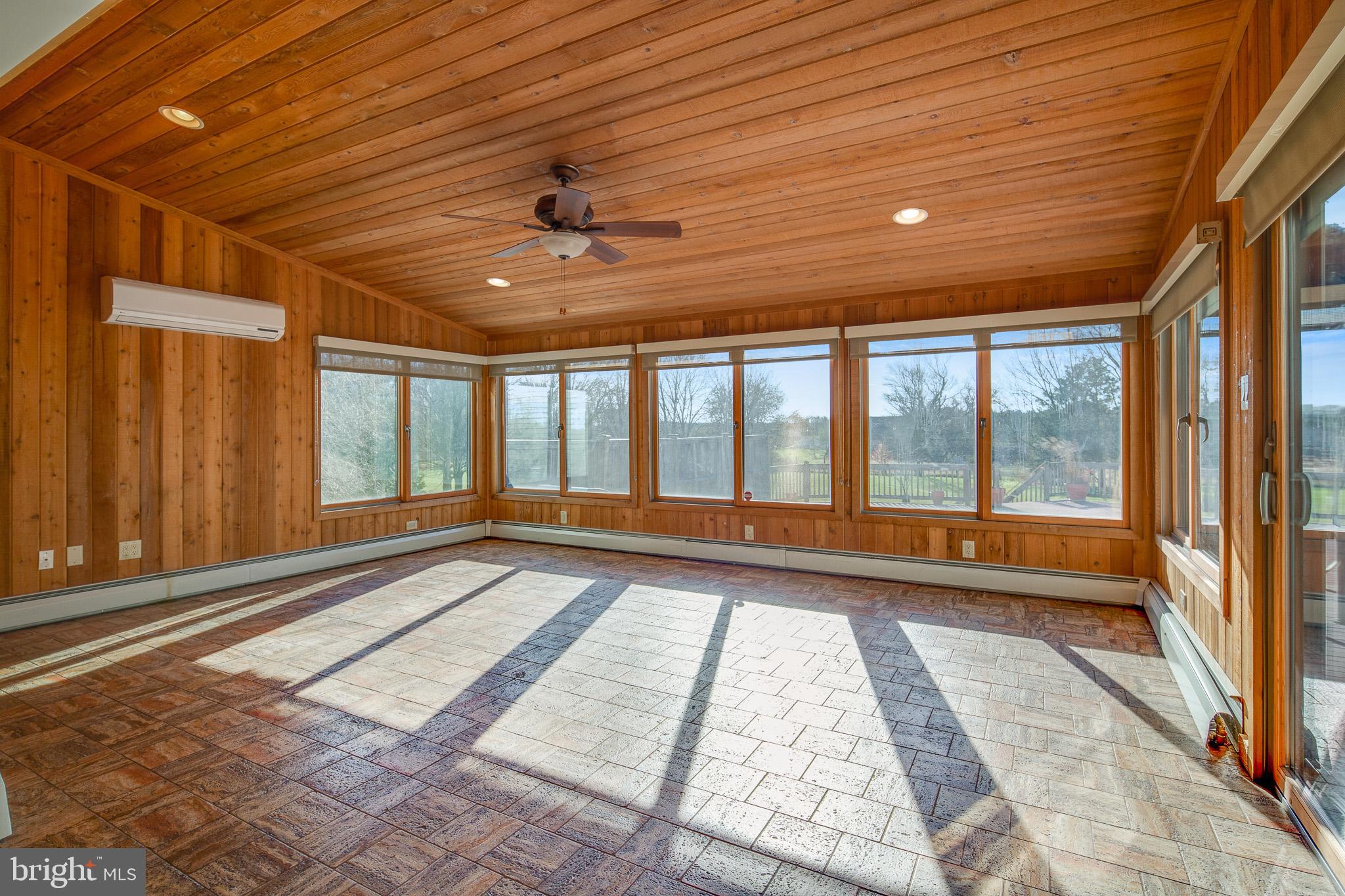 416 Ewan Road Mullica Hill, NJ 08062 - Photo 4 of 42 gorgeous sunroom made to look like a quiet lodge