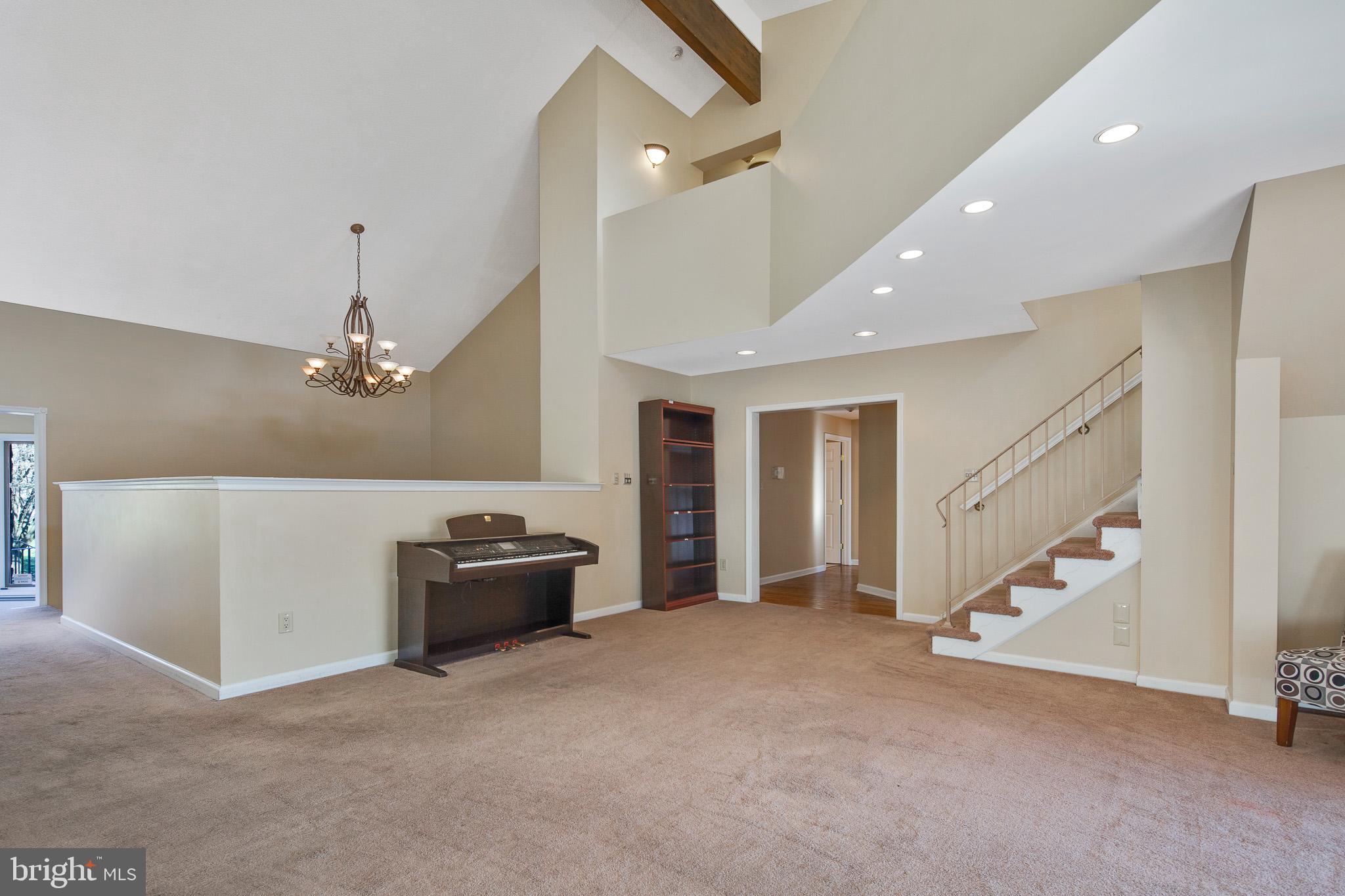 416 Ewan Road Mullica Hill, NJ 08062 - Photo 7 of 42 quiet living room is open to dining & family room