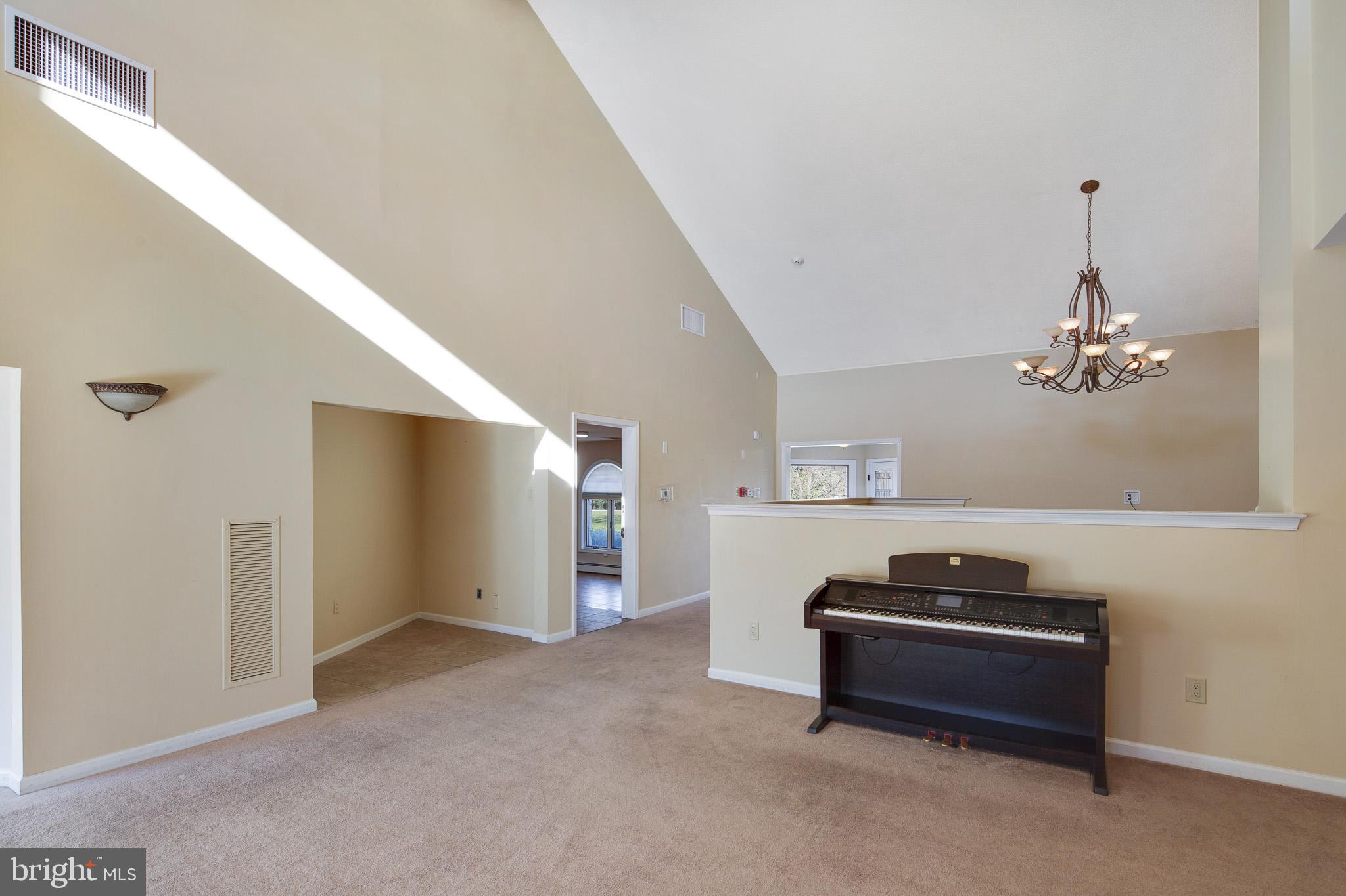 416 Ewan Road Mullica Hill, NJ 08062 - Photo 9 of 42 great room with cathedral ceilings adds DRAMA!