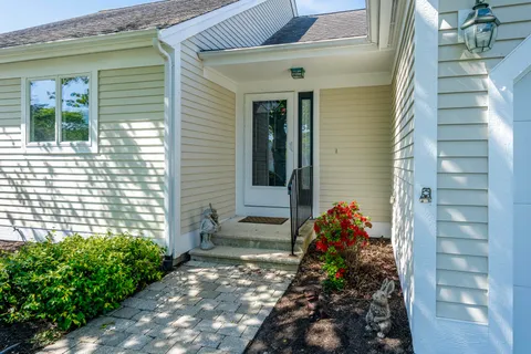 a view of a pathway of the house front of house