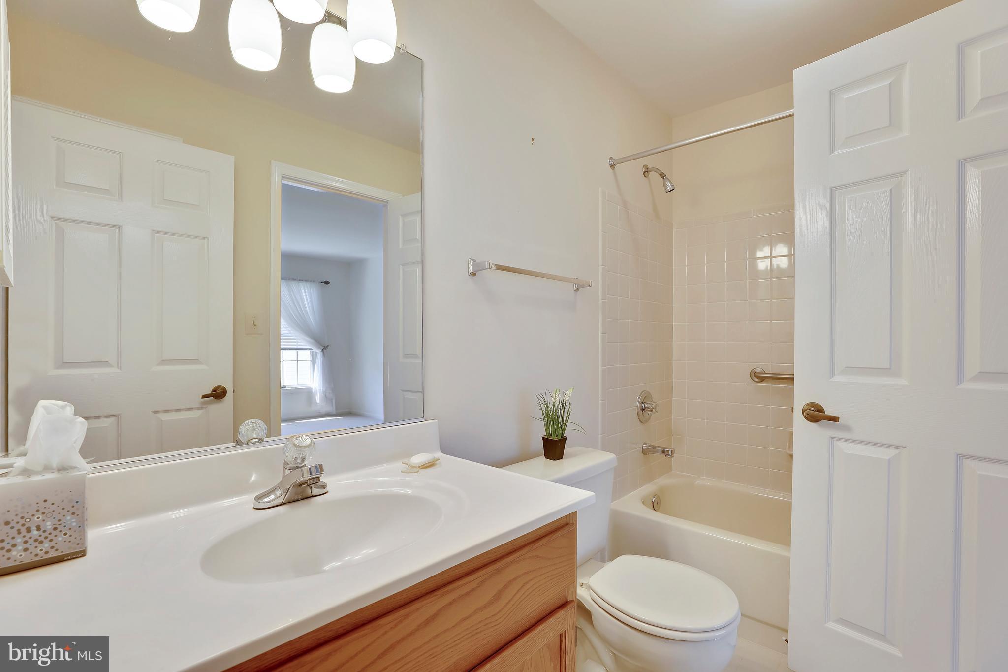 523 Coover Road Annapolis, MD 21401 - Photo 16 of 30 Hall Bath with a door to Bedroom 2