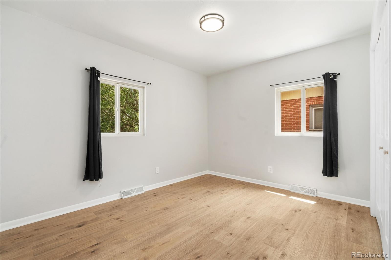 1304 South Lemay Avenue Fort Collins, CO 80524 - Photo 10 of 21 an empty room with a window