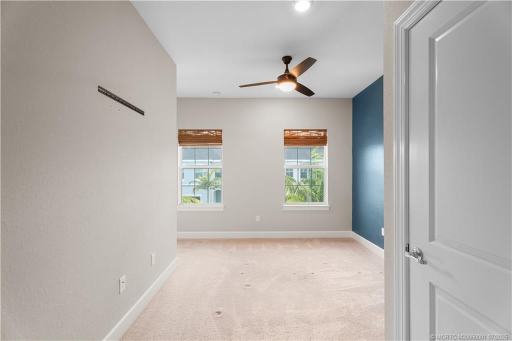 1857 Southeast Tarni Way Stuart, FL 34996 - Photo 13 of 21 a view of room with window and ceiling fan