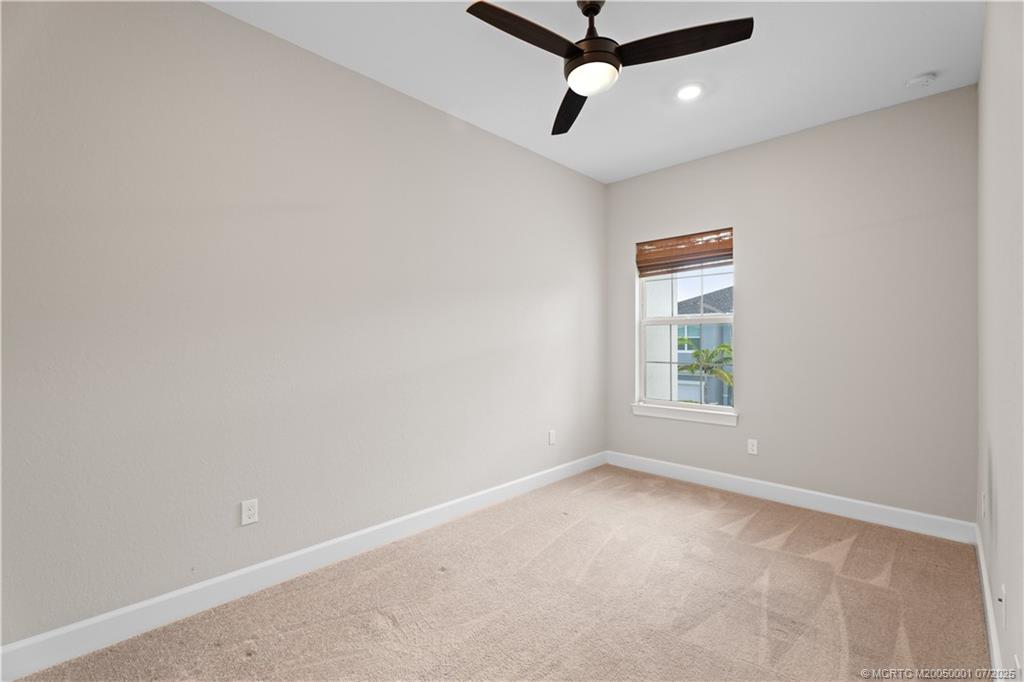1857 Southeast Tarni Way Stuart, FL 34996 - Photo 15 of 21 an empty room with a window