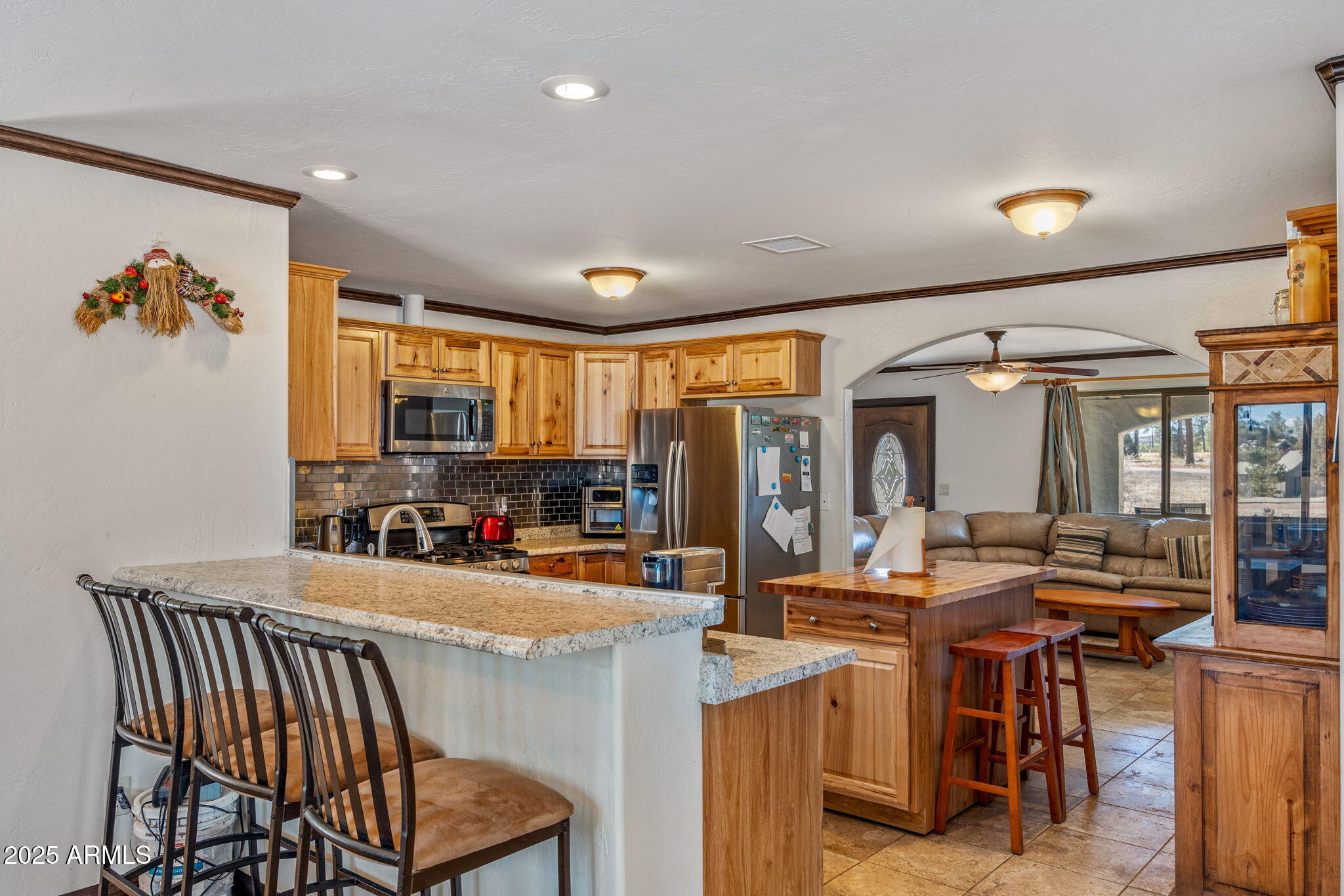 2727 Pine Meadow Drive Overgaard, AZ 85933 - Photo 9 of 34 a view of a dining room with furniture window and outside view