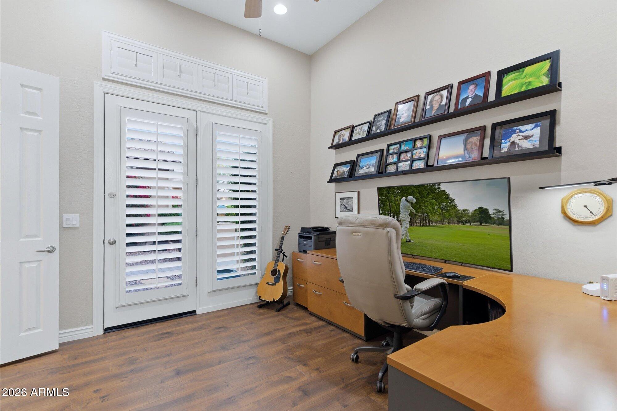 40322 North Hawk Ridge Trail Anthem, AZ 85086 - Photo 23 of 63 a view of a workspace with furniture and a window