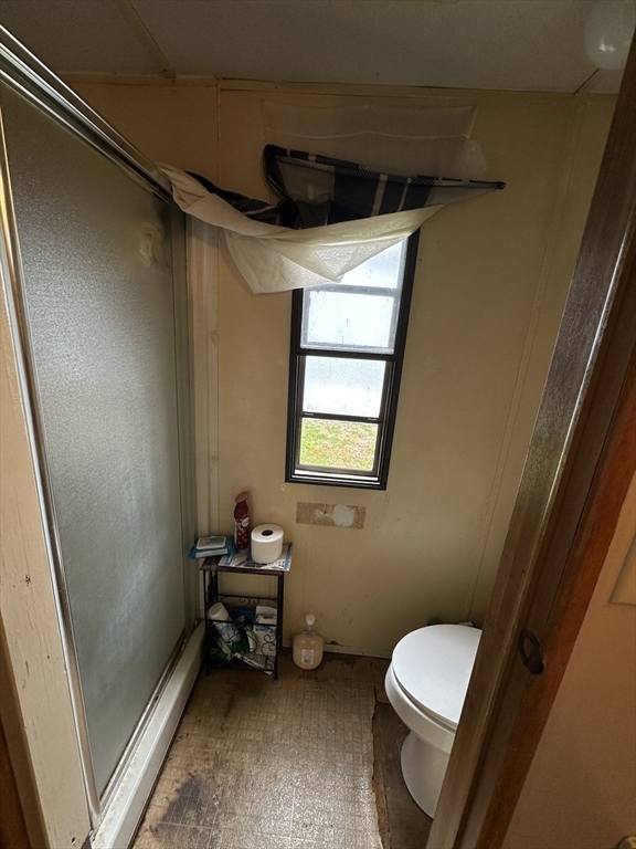 1 Independence Lane Warren, MA 01585 - Photo 14 of 16 a bathroom with a toilet a sink and a mirror