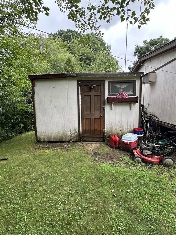 1 Independence Lane Warren, MA 01585 - Photo 15 of 16 a backyard of a house with lots of green space