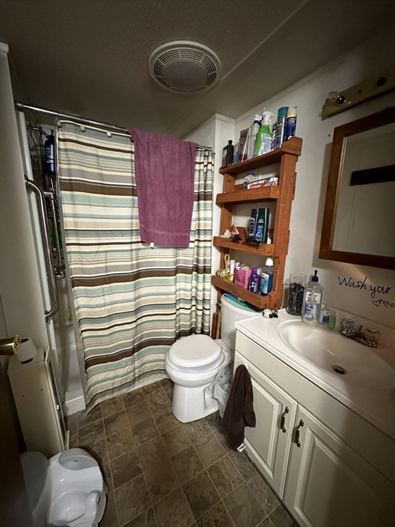 1 Independence Lane Warren, MA 01585 - Photo 8 of 16 a bathroom with a sink a toilet and shower curtain