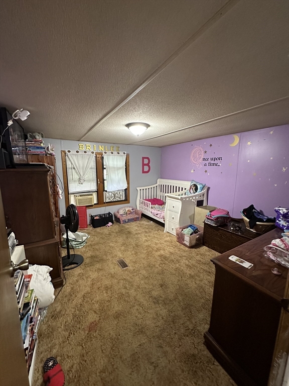 1 Independence Lane Warren, MA 01585 - Photo 9 of 16 a room with gym equipment and a flat screen tv