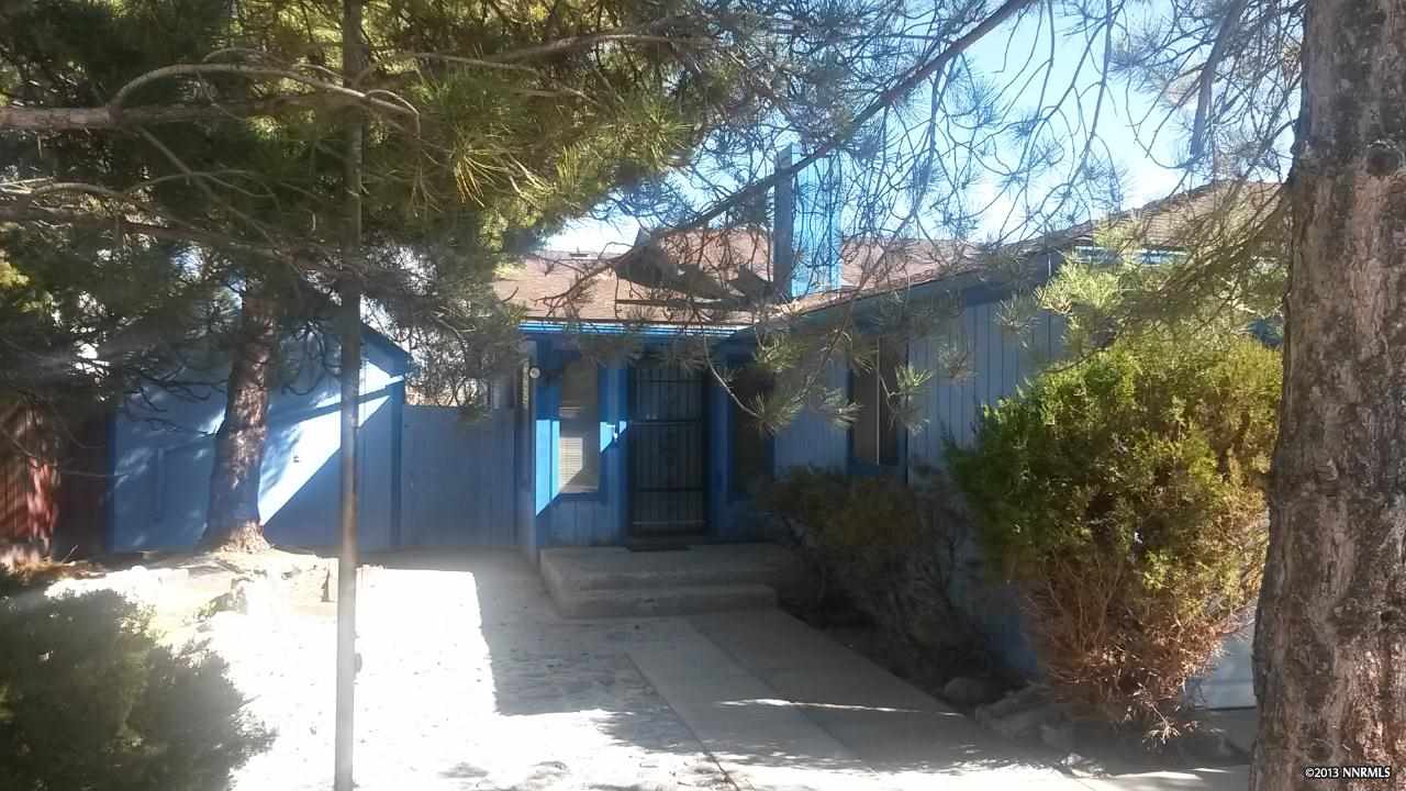 6835 Peppermint Drive Reno, NV 89506 - Photo 1 of 1 a view of a house with a tree