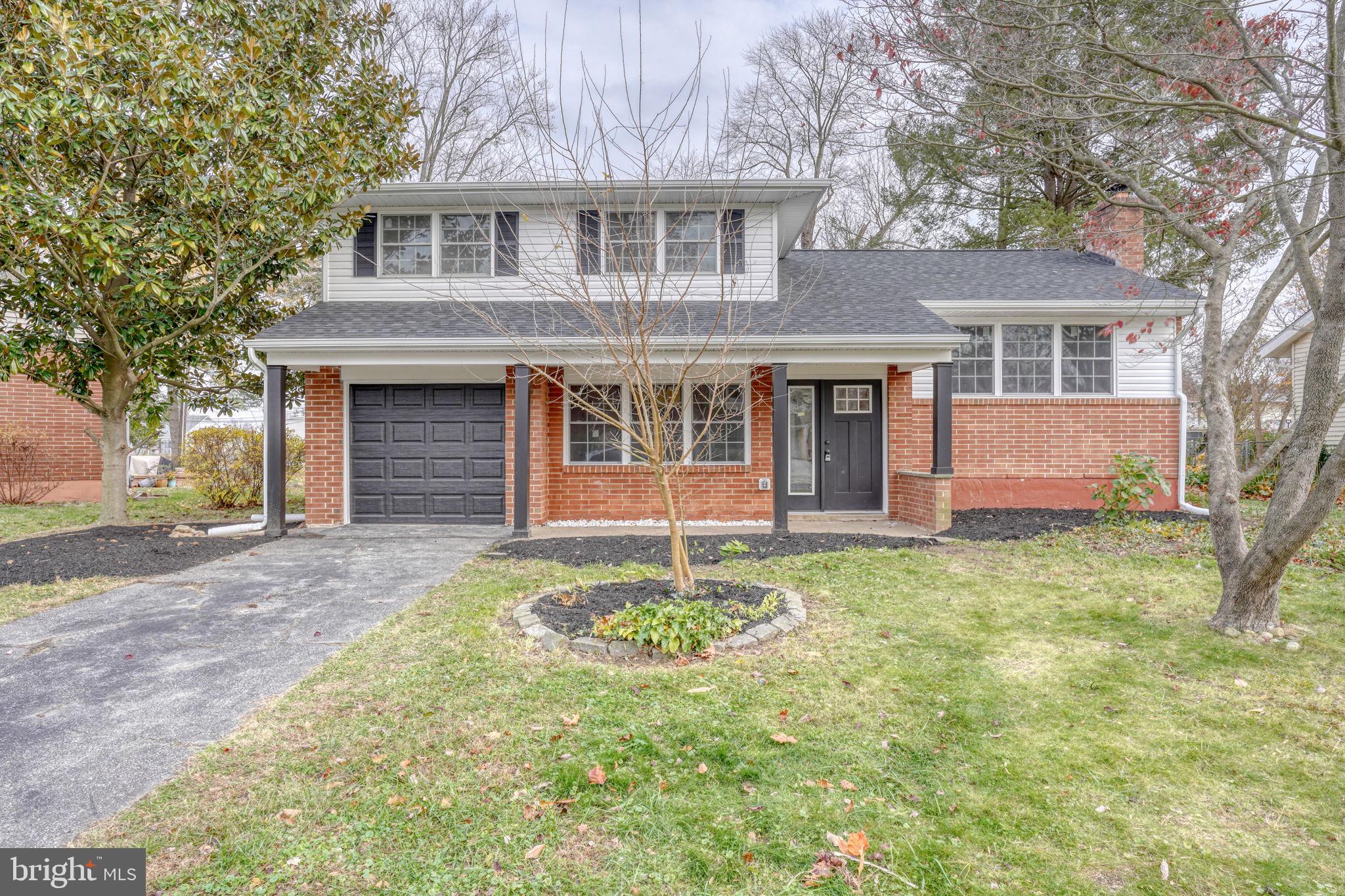 811 Sunset Terrace Dover, DE 19904 - Photo 1 of 45 a house with trees in front of it
