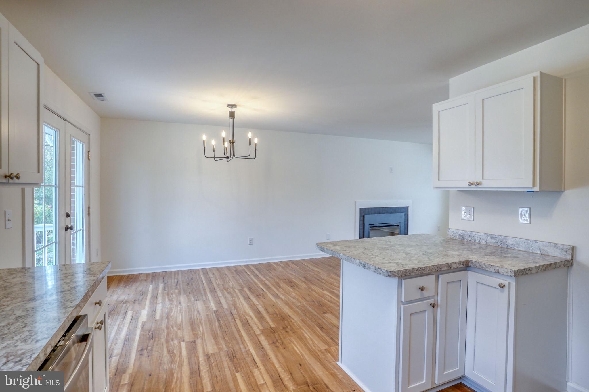 811 Sunset Terrace Dover, DE 19904 - Photo 12 of 45 a kitchen with a hard wood floor