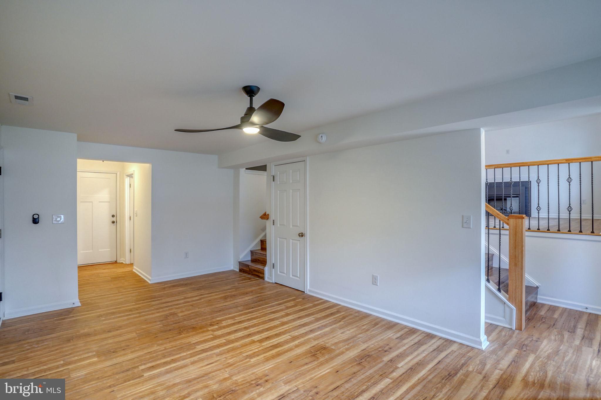 811 Sunset Terrace Dover, DE 19904 - Photo 20 of 45 a view of empty room with wooden floor