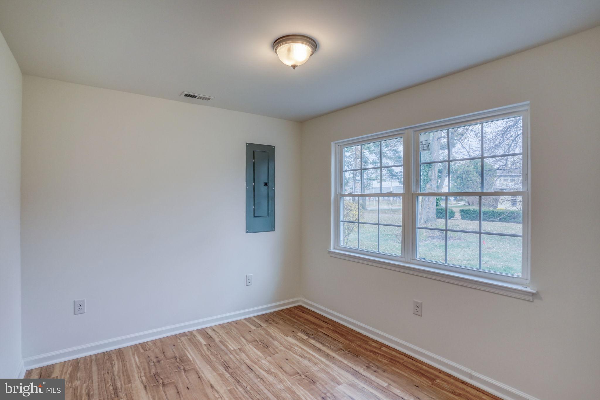 811 Sunset Terrace Dover, DE 19904 - Photo 22 of 45 an empty room with a window