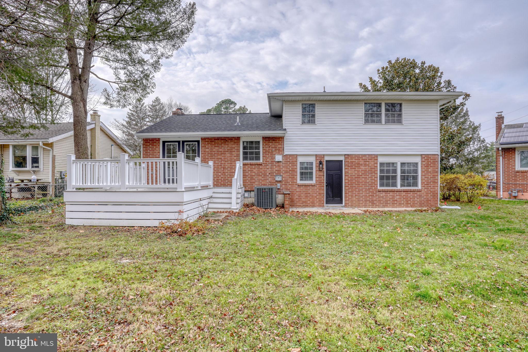 811 Sunset Terrace Dover, DE 19904 - Photo 36 of 45 a front view of a house with a garden